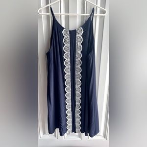 Navy blue spaghetti strap dress with white lace detail